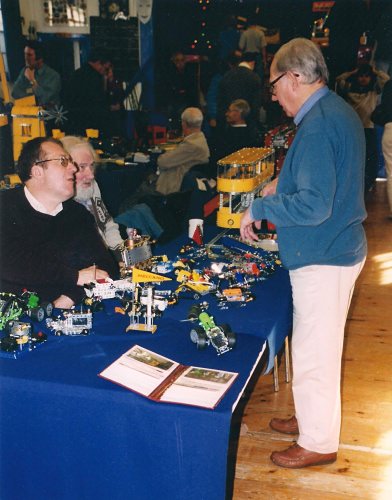 Geoff Davison (standing) chats to Peter Clay and Geoff Carter at our 25th exhibition in October 2003 at the 3rd Bromley Scouts Group Hall