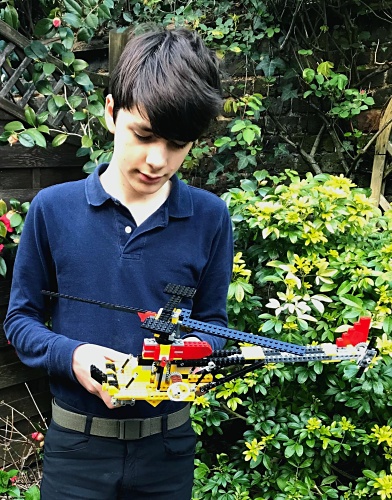 Figure 1: Luka with a Lego helicopter
