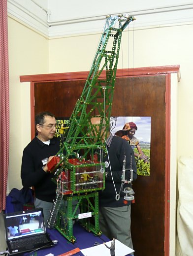 Alan (left) operating his robotic crane