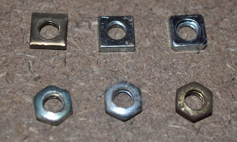 Nuts L–R: Top: Square, brass; Square, steel; Square, steel, chamfered. Bottom: Hex, plated (from Meccanoids set, c. 1979); Hex, steel; Hex, originally brass plated?