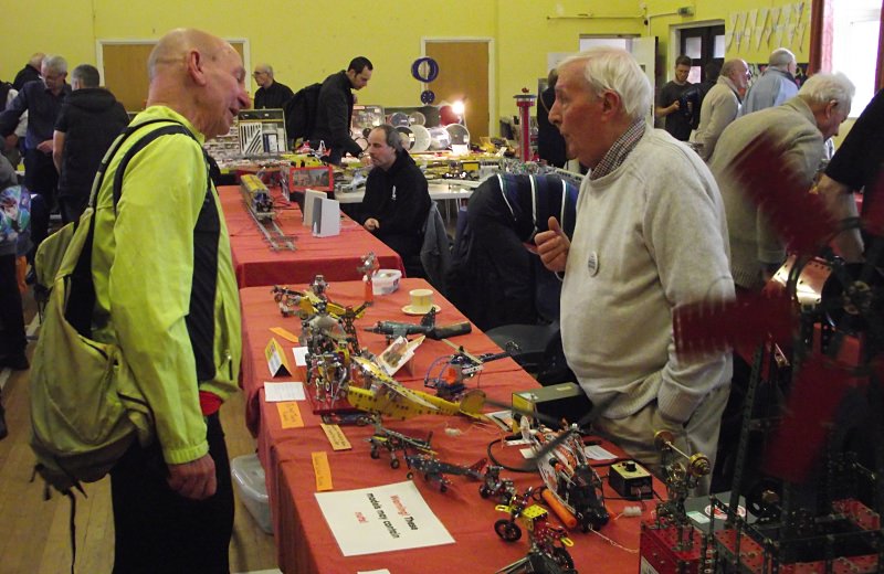 John Cowdery (right) talking to a visitor about his models