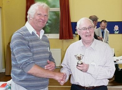 Frank Paine (left) awards the Cup to Jim MacCulloch