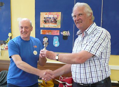 Frank Paine (right) awards the Cup to Chris Fry
