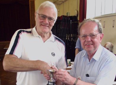 Adrian Ashford (right) awards the Cup to Alan Wenbourne